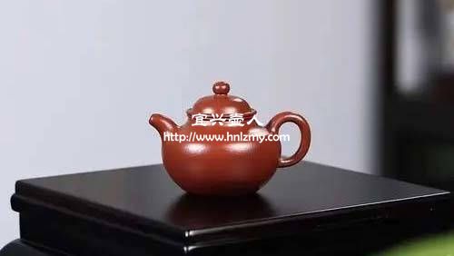 朱泥壺泥料中有顆粒而且顏色不紅正常嗎