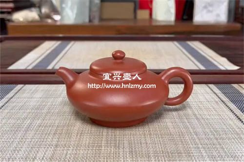 紫砂壺上的圖案遇熱水變顏色是怎么回事