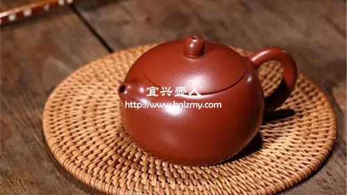 大紅袍紫砂壺加熱水變色正常嗎