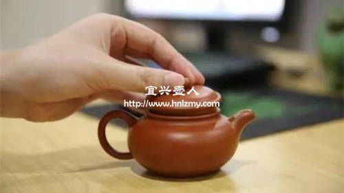 敲聲音主要用來判斷紫砂壺有沒有內傷
